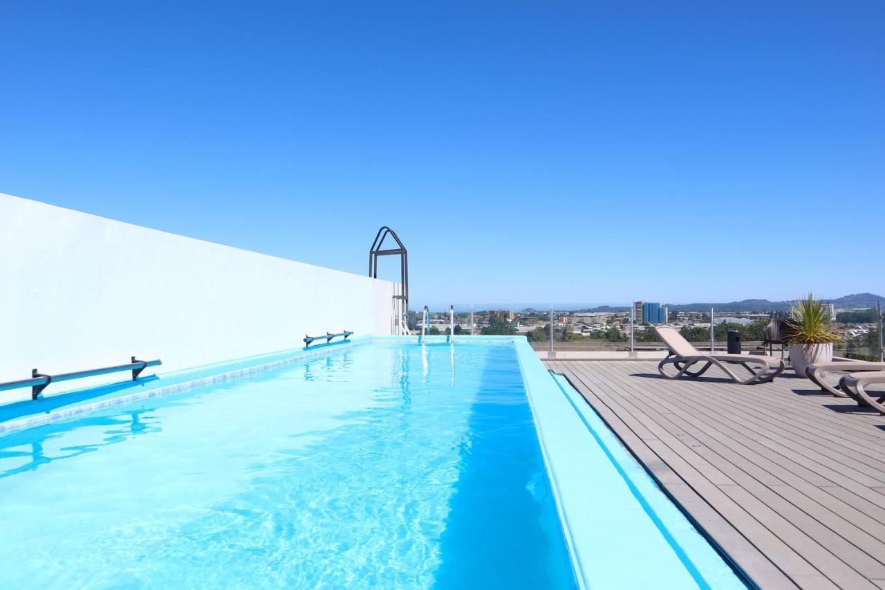 Hotel Wyndham Concepcion Pettra Esterno foto Rooftop pool