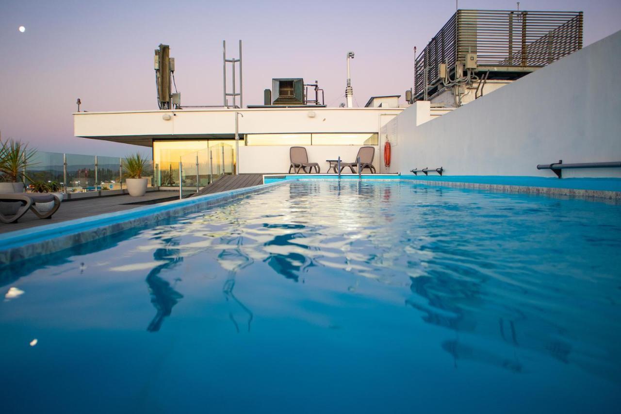Hotel Wyndham Concepcion Pettra Esterno foto Rooftop pool