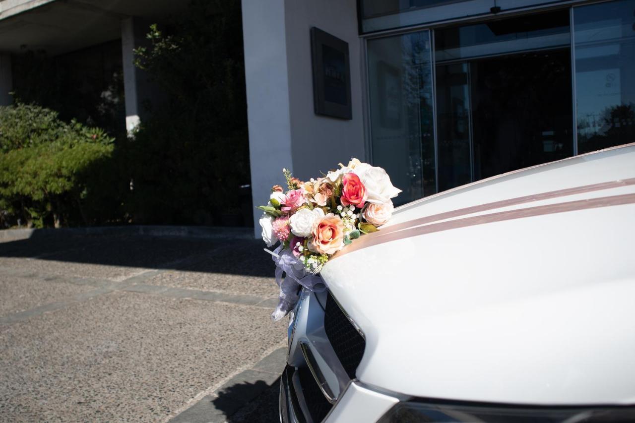 Hotel Wyndham Concepcion Pettra Esterno foto Wedding car