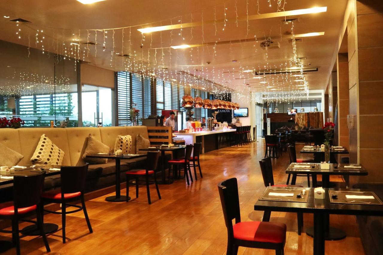 Hotel Wyndham Concepcion Pettra Esterno foto The interior of the restaurant