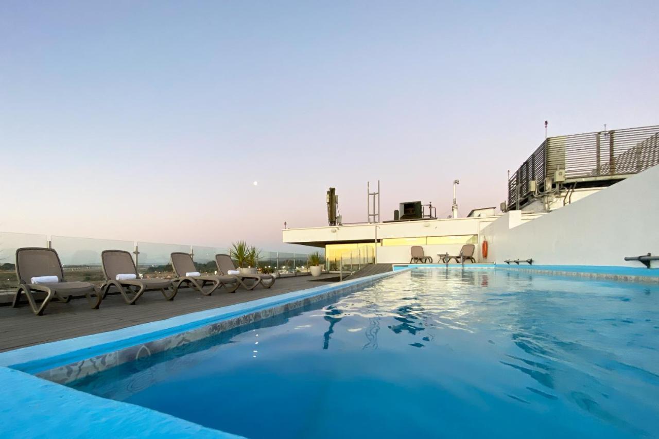 Hotel Wyndham Concepcion Pettra Esterno foto Rooftop pool
